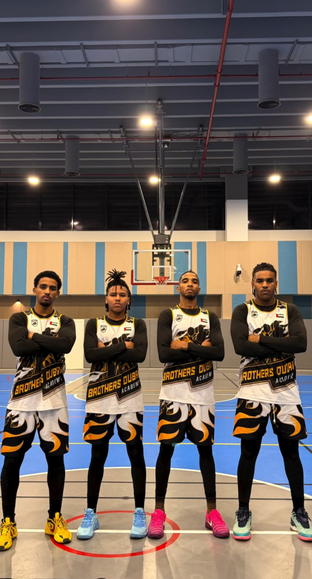 Brothers Dubai Academy coaches lined up on court